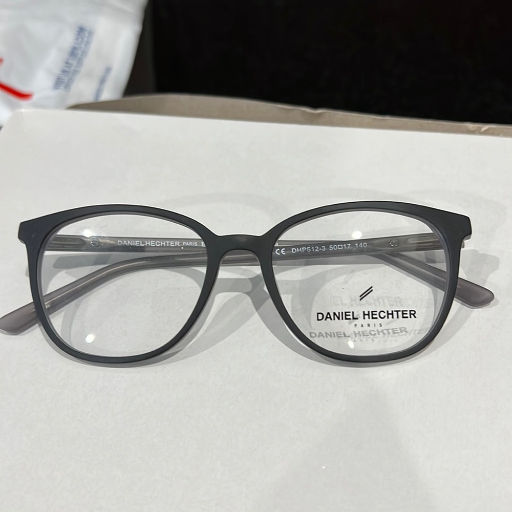 Brand new Authentic Daniel Hechter Eyeglasses Case & Wipe included